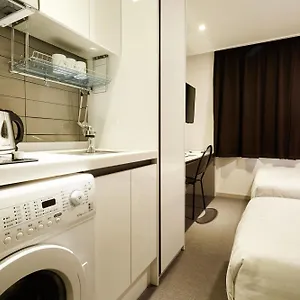 & Aparthotel